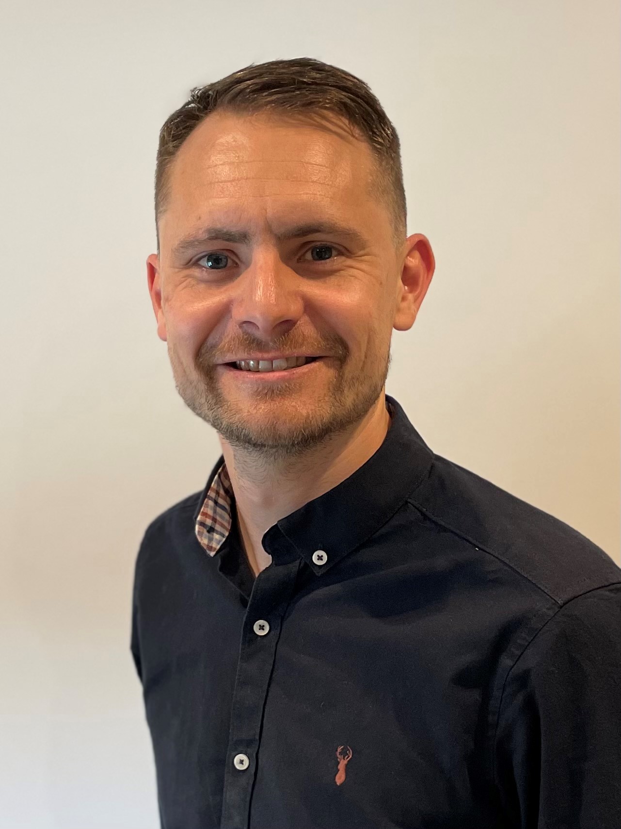 Adam Stacey Executive Director